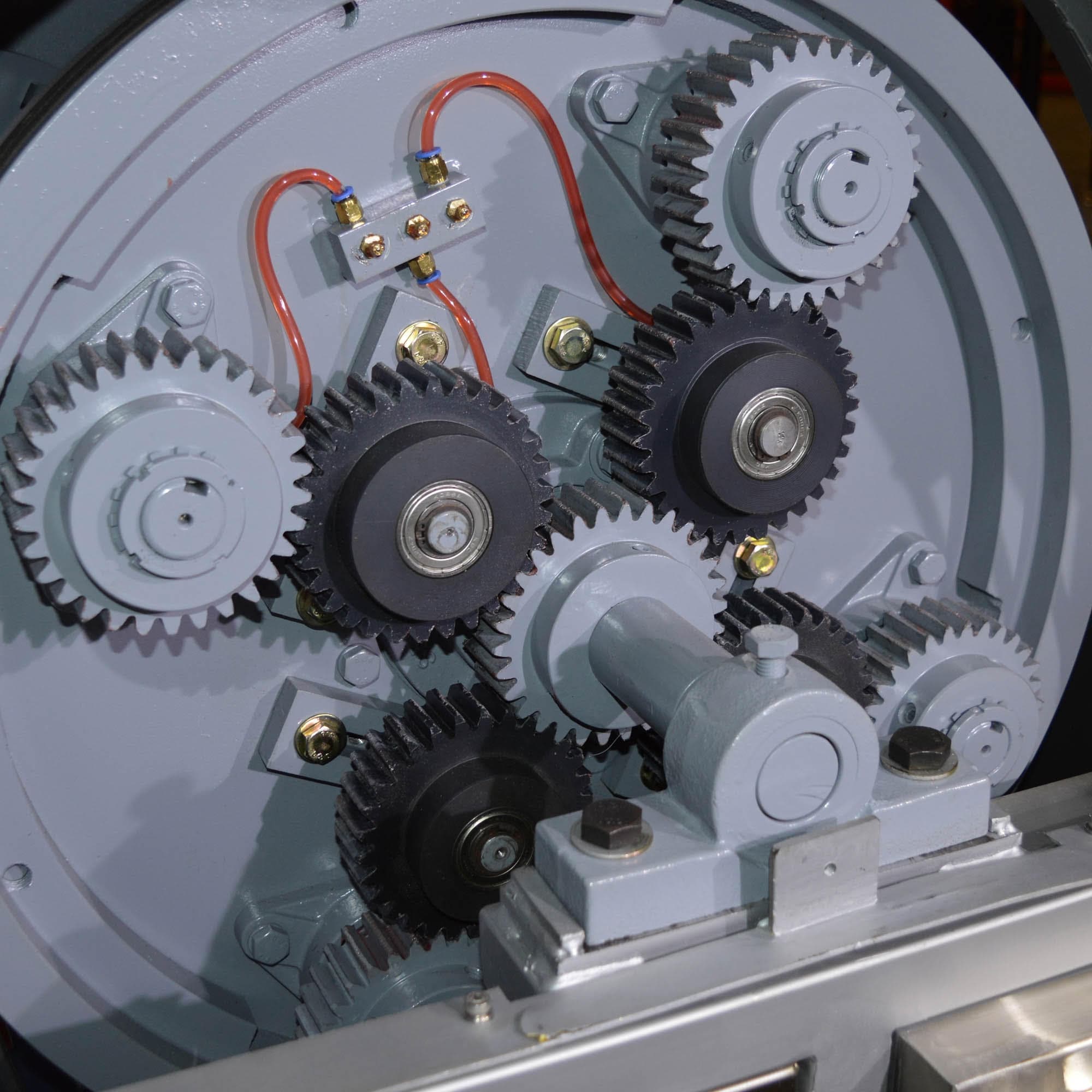 Actual CV8-600 gear-drive assembly with meshing gears, bearings, shafts, and lubrication lines