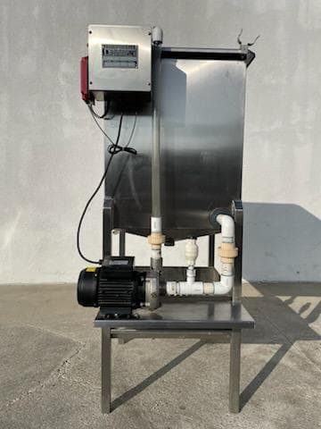 Actual WW 55 wastewater recycling system with stainless steel tank, controller, and recirculation pump