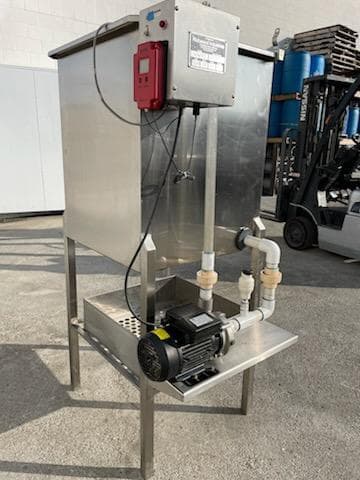 Side view of the WW 55 showing the controller, pump, and recirculation plumbing