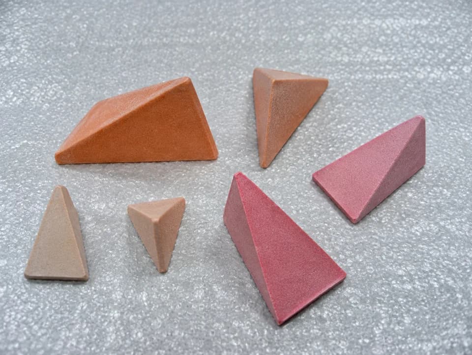 Wedge (Bowtie) synthetic finishing media — enhanced supplier photograph